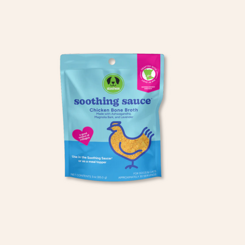 Package of soothing sauce for pets with a blue and pink design on a white background