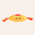 Plush toy resembling a hot dog with a smiling face on a white background