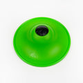 Green plastic cone-shaped object on a white background